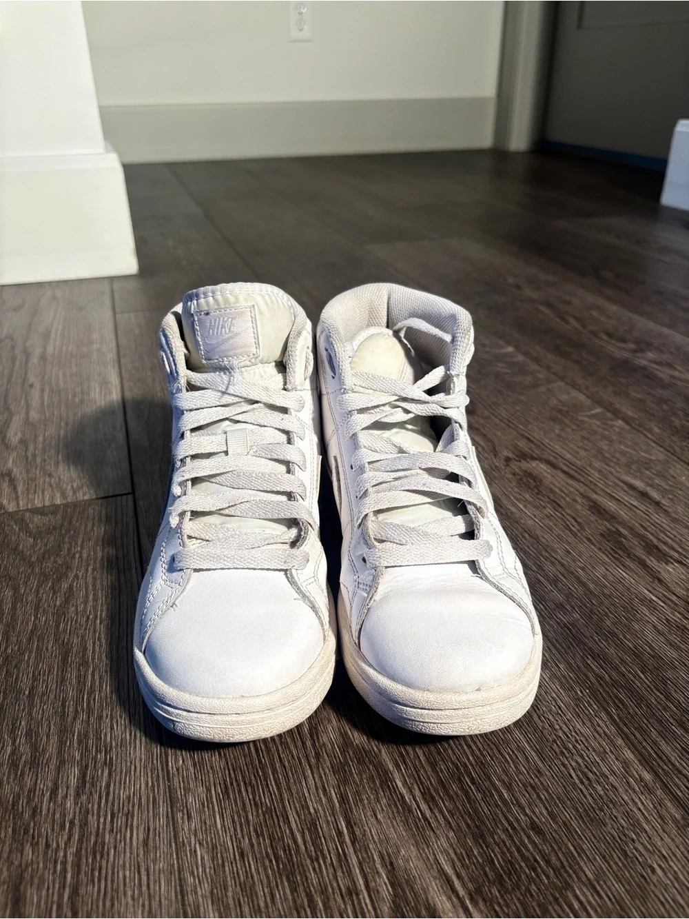 Nike White High-Top Sneakers with Tan Logo Patch